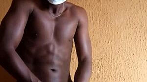 African muscular man shuffles a big dick