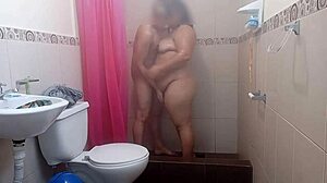 Busty homemade girl fucks her stepson in bathroom Big tits and ass babe gives a blowjob to her stepson in the bathroom