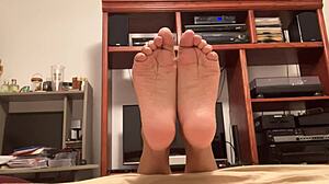 A video by a Latino gay man shows off his feet with toes and soles