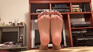 A video by a Latino gay man shows off his feet with toes and soles