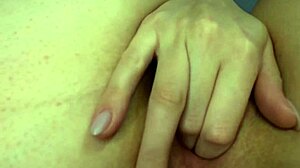 Girl pleases herself in close-up, put through fingers