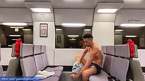 Cute sporty guy shows off his stuff on a rail ride