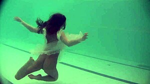 Natasha's underwater striptease: a short Russian teen’s exotic pool trip