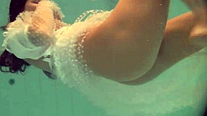 Natasha's underwater striptease: a short Russian teen’s exotic pool trip